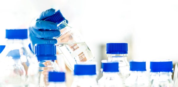 glass containers and bottles for the research of chemical substances in the laboratory. banner