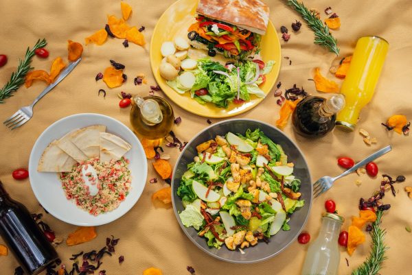 Picnic tablecloth with healthy food and drinks