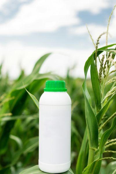 Mockup white bottle. Copy space for herbicide, fungicide or insecticide